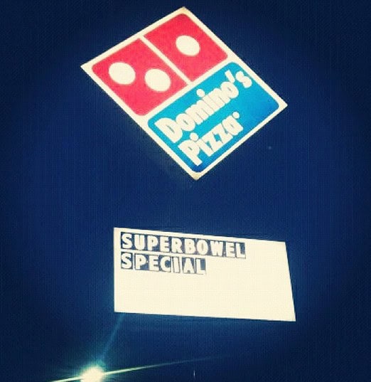 dominos pizza sign