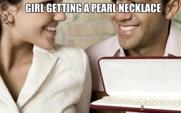 girl getting a pearl necklace