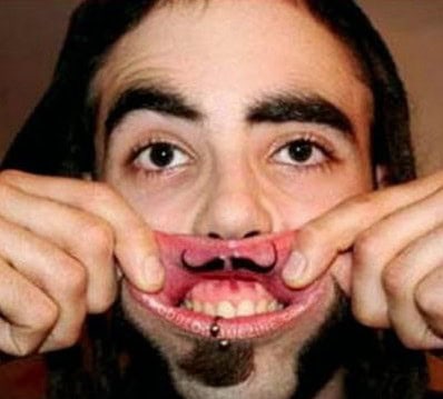 lip mustache tattoo