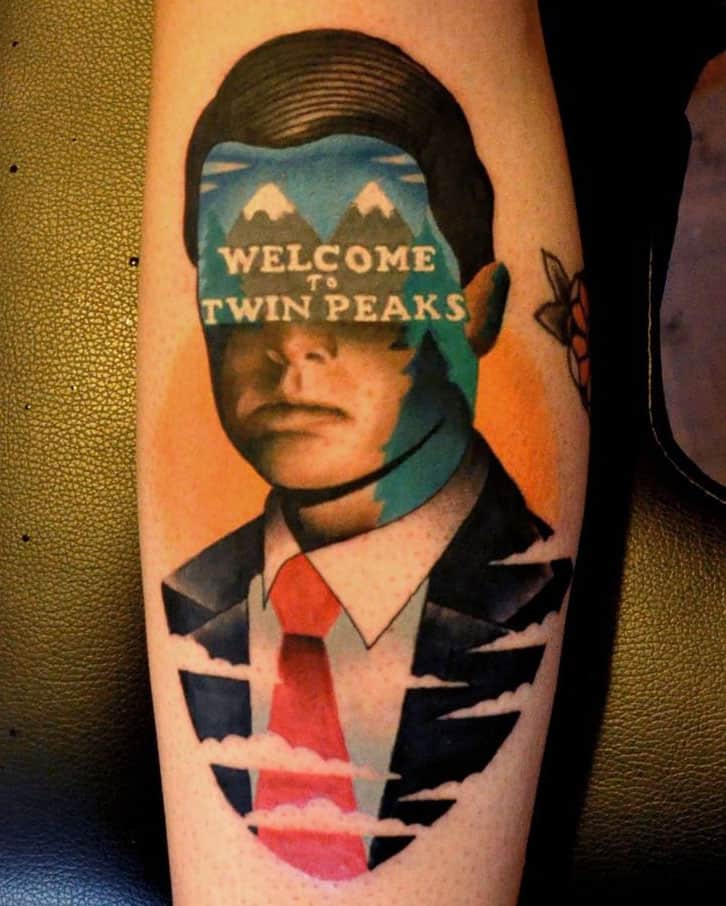 Twin Peaks hands tattoed on the rib