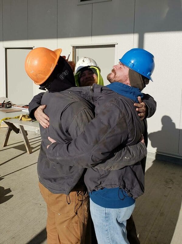 construction workers hugging inside a big coat, Uplifting wholesome images, nice pictures of animals and people, humanity restored, wholesome pics, reddit, r wholesome, funny cute animals, feeling good